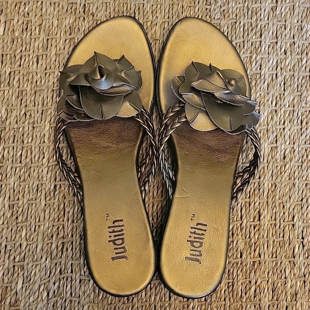 JUDITH bronze sandals with double braided straps, rosette at toe.  Size 7.